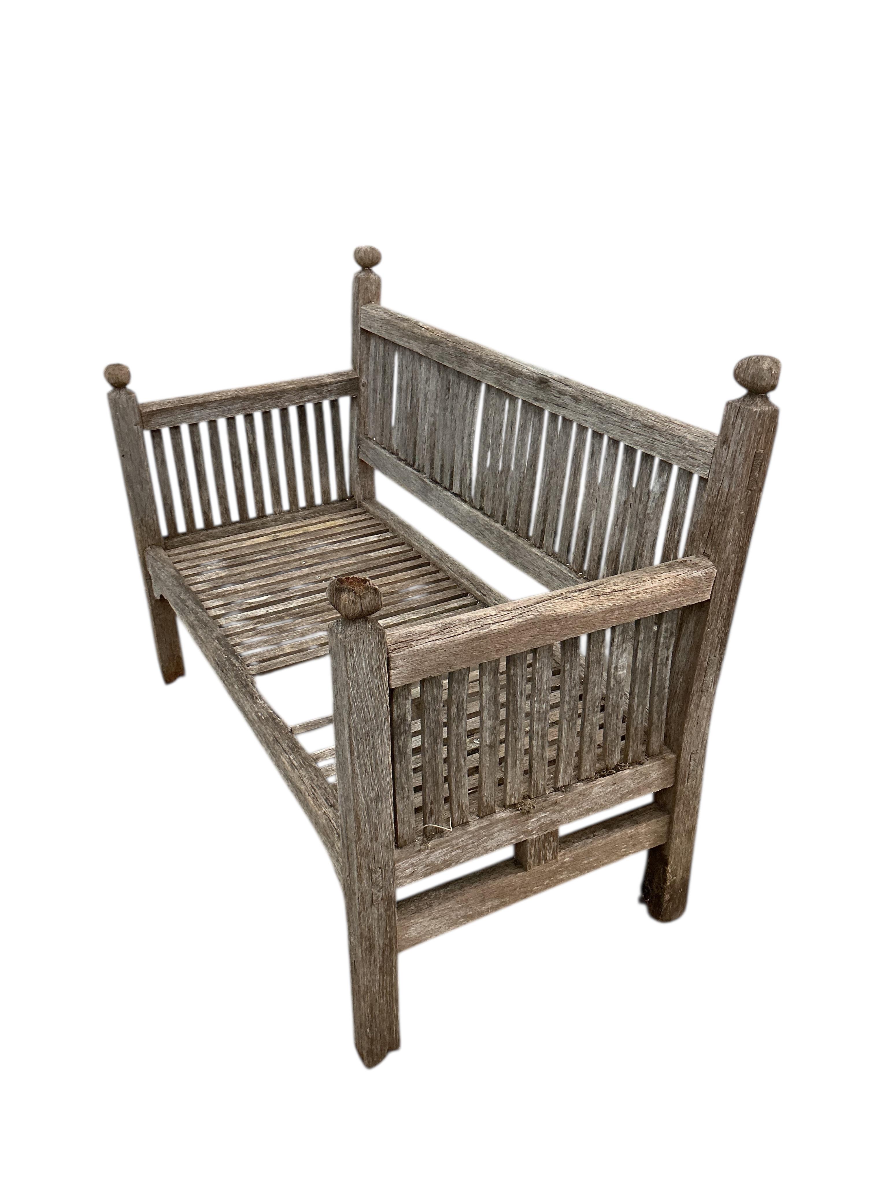 A Heals weathered teak garden bench, width 114cm, depth 56cm, height 84cm